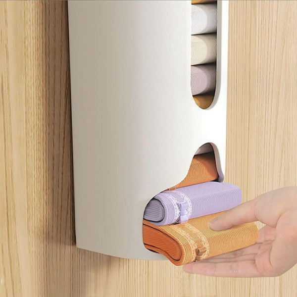 “Wall Mounted Towel Storage Dispenser – Space Saving Bathroom Organizer for Rolled Towels & Cloths”