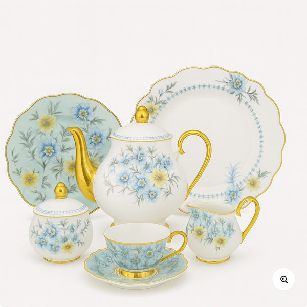 "Elegant Floral Porcelain Tea Set with Gold Accents – 7 Piece Collection"